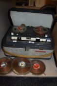 A vintage Phillips reel to reel tape recorder.