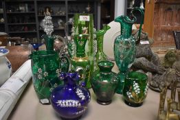 A collection of vintage glass ware, many items with enamel and gilt detailing, including Mary