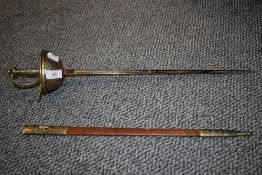 A decorative Spanish ceremonial sword having leather scabbard, marked Toledo to balde.