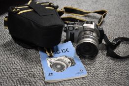 A Canon EOS IX camera with Canon EF 24-85mm 1:3,5-4,5 lens
