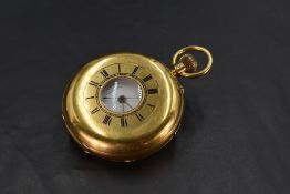 An Edwardian 18ct gold Half Hunter top wound pocket watch by J Freedman of Birmingham having Roman