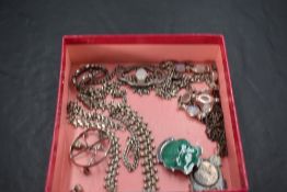 A small selection of silver and white metal jewellery including a silver ball and link chain,