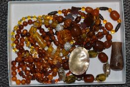 A selection of mixed Baltic amber beads and necklaces etc