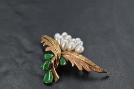 A yellow metal brooch stamped 14k having pearl and jade style decoration, approx 7.9g