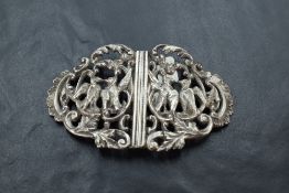 An Edwardian silver nurses buckle having moulded ornithological decoration, Birmingham 1901