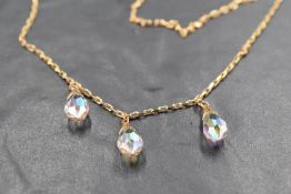 A 9ct gold paper link chain having a trio of fixed crystal drops, approx 20' & 5.1g