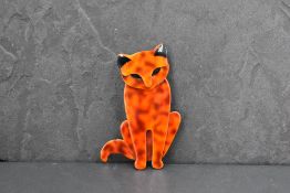 A Lea Stein of Paris laminated celluloid seated cat brooch