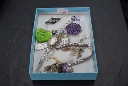 A selection of silver jewellery including dress watch with matching bracelet, earrings, chains