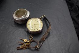 An Edwardian silver key wound pocket watch by T & E Rhodes of Kendal , no:25802 having Roman numeral