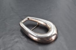 A Danish silver brooch by Georg Jensen no: A107 of stylised naturalistic form
