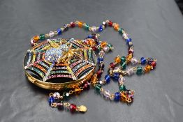 A 1980's oversized spider compact mirror necklace by Butler & Wilson having extensive crystal and