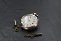 A small continental silver key wound pocket watch having Roman numeral dial to decorative