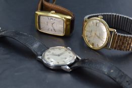 Three gent's Omega wrist watches including Deville automatic and vintage steel cased