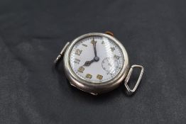 An early 20th century Swiss white metal cased wristwatch, of circular form with Arabic numeral