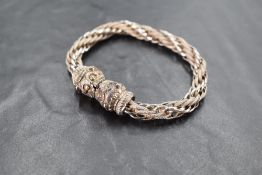 A white metal twist link rope bracelet with a Chinese style lion head clasp,no marks but probably