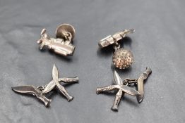 A pair of golfing interest imported silver cuff-links, formed as golf bag and clubs, bearing