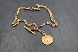 A 9ct rose gold graduated curb link watch chain with bar and medalion fobs, approx 45.4g