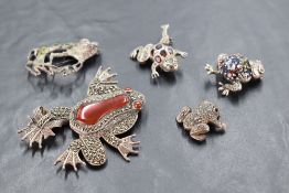 Five silver brooches modelled as frogs