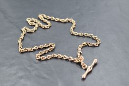 A 9ct gold fancy link necklace having T bar fitting, adapted so can be split, approx 17' & 20.5g