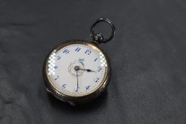 A small Victorian silver key wound poicket watch having blue Arabic numeral dial to white enamel