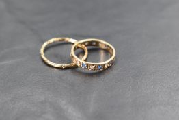 Two 9ct gold band rings, one having twist decoration the other having paste stone decoration, AF,