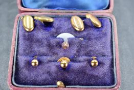 A pair of 9ct gold cufflinks having plain oval panels with chain connecters approx 2.7g and four