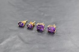 Two pairs of heat treated amethyst and 9ct gold stud earrings of similar form