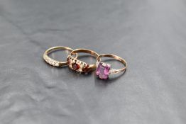A group of three 9ct gold and yellow metal rings, gross weight 4.5grams