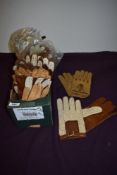 Around thirty pairs of vintage gents leather driving gloves, unworn, most with original tags.