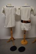 Two vintage naval shirts, two berets and a belt.