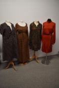 Four 1970s dresses, including handmade maxi dress of Laura Ashley fabric and John Marks midi dress.