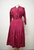 A 1940s cerise/raspberry taffeta evening dress having large statement shawl collar, 3/4 sleeves,