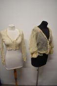 A late Victorian/ Edwardian tulle lace bodice having extensive ruffled lace cuffs and a similar lace