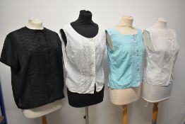Three 1950s cotton blouses and a black 1960s nylon example.