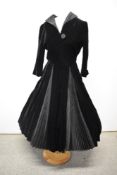 A late 1940s black velvet Elmoor of London dress, having contrasting taffeta concertina pleats to