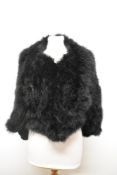 A 1930s black Art Deco Marabou cape, fully lined, with internal straps.