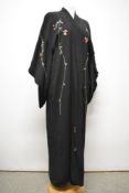 A circa 1930s kimono dressing gown, having extensive silk embroidery throughout, including pagoda