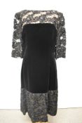 A late 1950s/ 60s Phylis Taylor velvet dress, having tulle yolk, sleeves and hem with braided