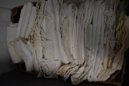 A large collection of vintage and antique bed linen, including sheets, pillow cases and bolster