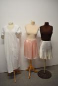 Two pairs of tap pants including cream 1930s/40s pair with coffee lace trim and ladder work and an
