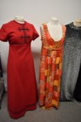 Four 1960s and 70s dresses, including cherry red wool 'Donna Gay, London' maxi dress and black and
