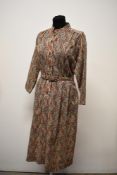 A 1970s Liberty of London pure new wool dress,'Hildebrand, London' lable to nape also.