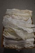 A large collection of vintage and antique table linen, some beautiful techniques used throughout the