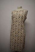 A 1960s 'Moygashel' pure Irish linen day dress having grey and beige floral embroidery throughout,