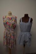 Two retro play suits, one striped and the other floral.