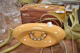 Two as new British Telecom Genie telephone sets with one having original box.