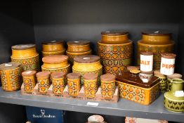 A great collection of mid century Hornsea Pottery Bronte pattern kitchen storage jars, also with a