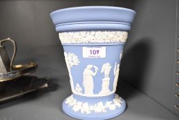 An early 20th century Wedgwood Jasperware blue ground Rose bud vase.