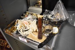 A collection of modern costume jewellery including wristwatches, necklaces, yellow metal ear rings