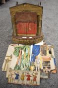 A late Victorian Pollock's Theatre with back drops and set pieces.